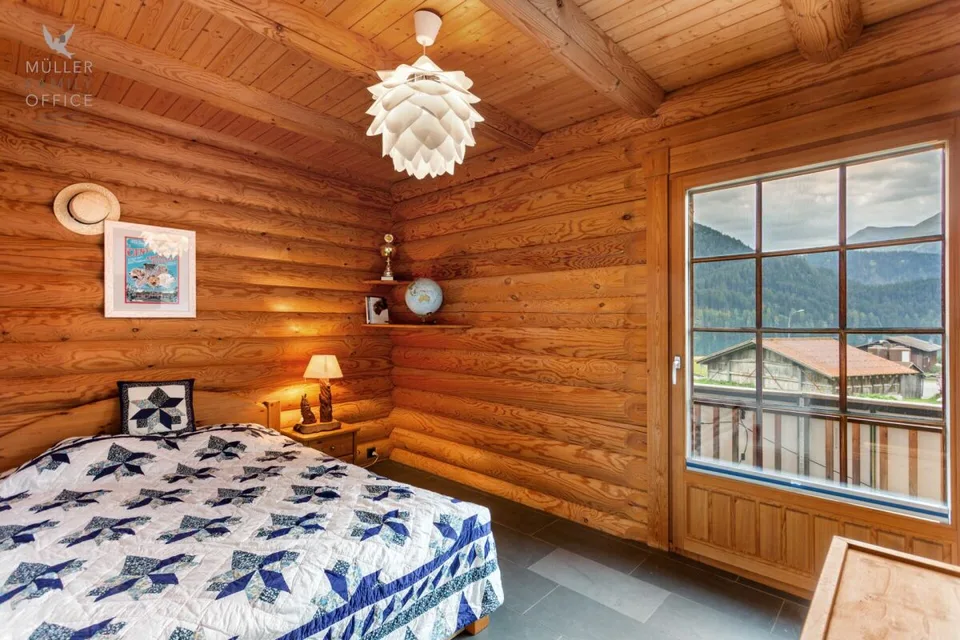 Casa in legno esclusiva con fascino alpino inconfondibile – foto 7 di 13