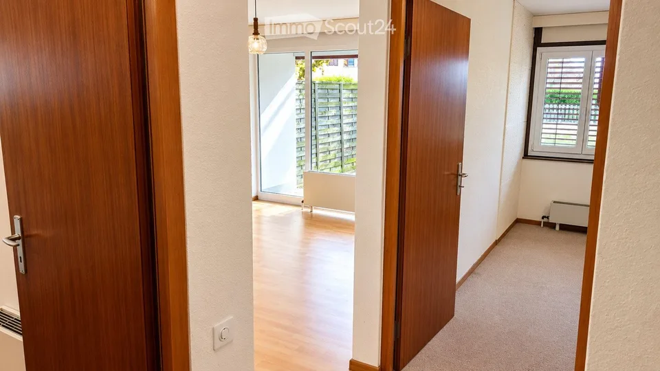 2,5 Zimmer-Erdgeschosswohnung mit eigenem Garten in Préverenges