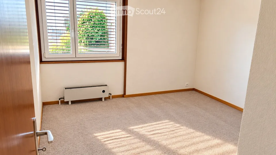 2,5 Zimmer-Erdgeschosswohnung mit eigenem Garten in Préverenges
