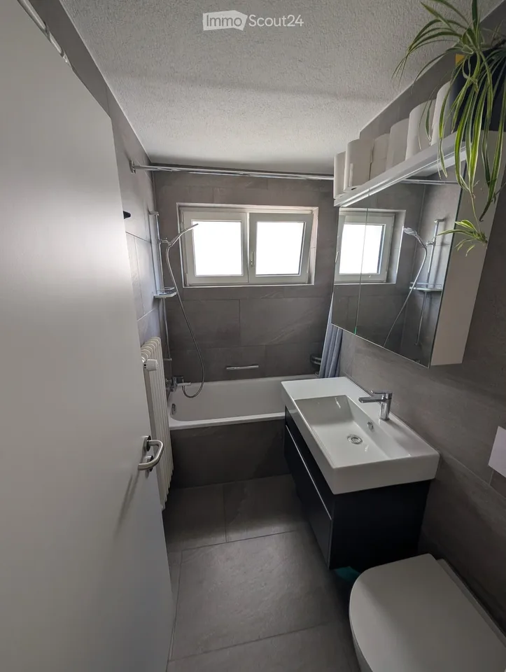 Modern living in Kloten: Well-kept ground floor apartment with garden seating area