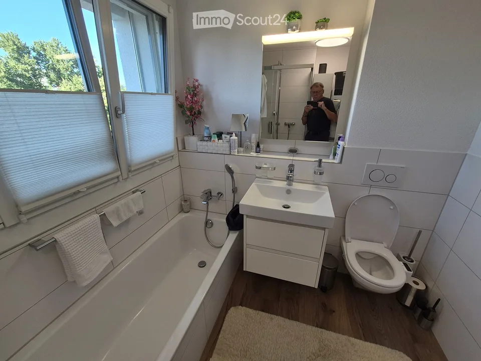 Modern 4.5-room attic apartment in Hochdorf – First-class living with a far-reaching view