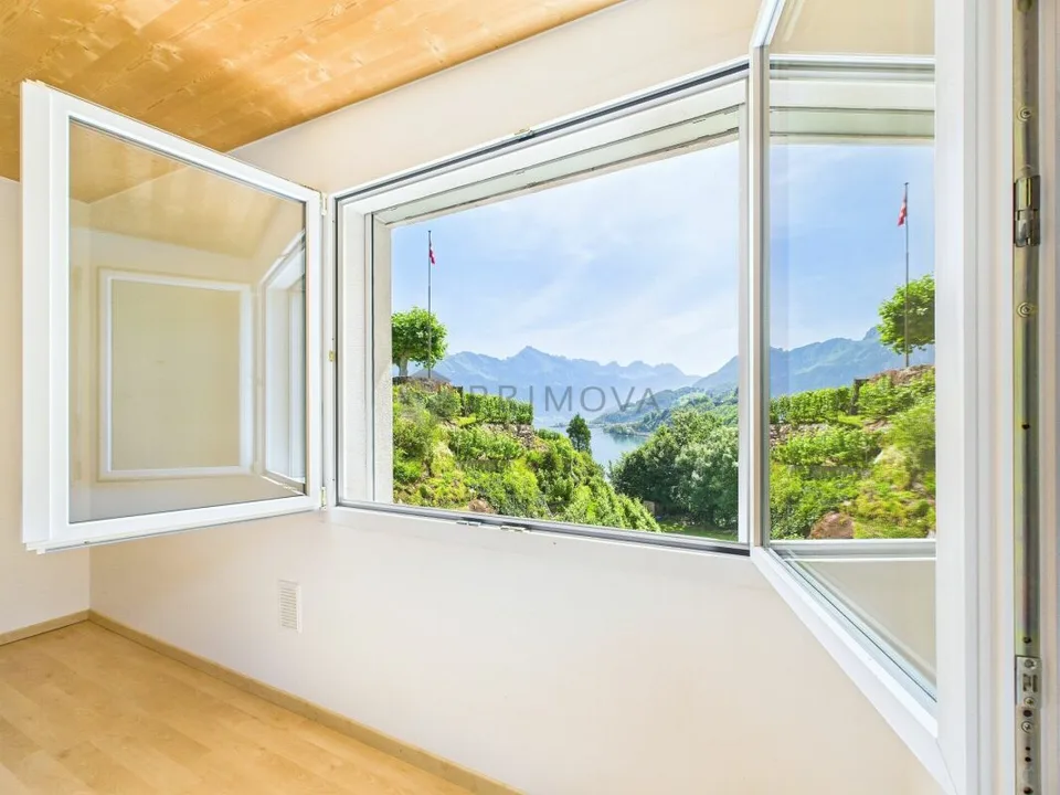 Lakefront Living: Furnished 2.5 Room Holiday Apartment with Panorama Terrace & Parking