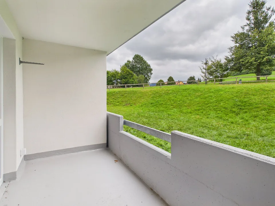 Appartement lumineux 3.5 pièces avec balcon et belle vue à Speicher AR