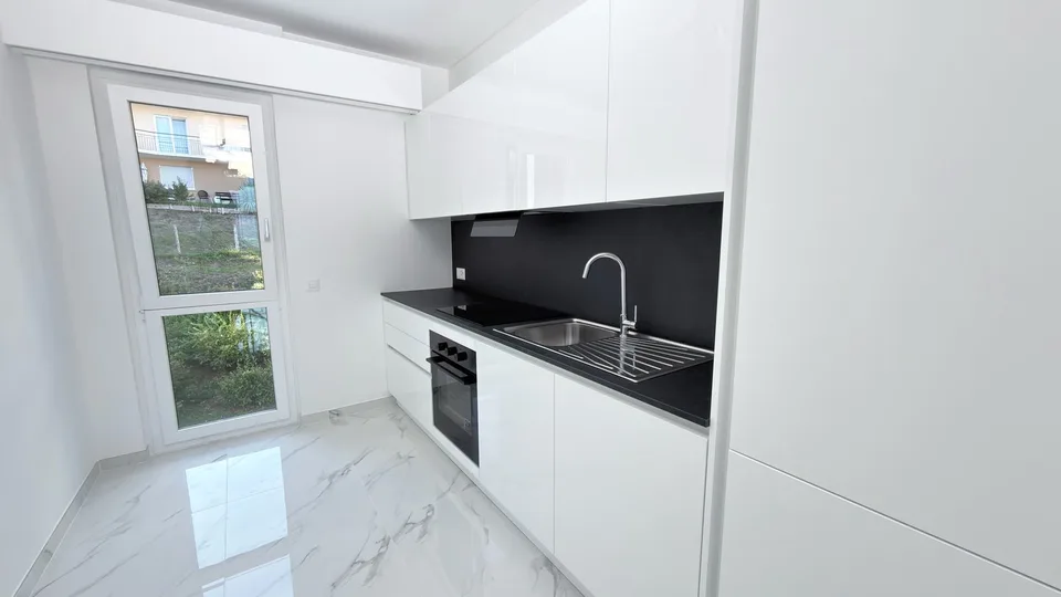 Lugano-Breganzona | Appartement de 3,5 pièces avec terrasse et parking – photo 4 sur 24