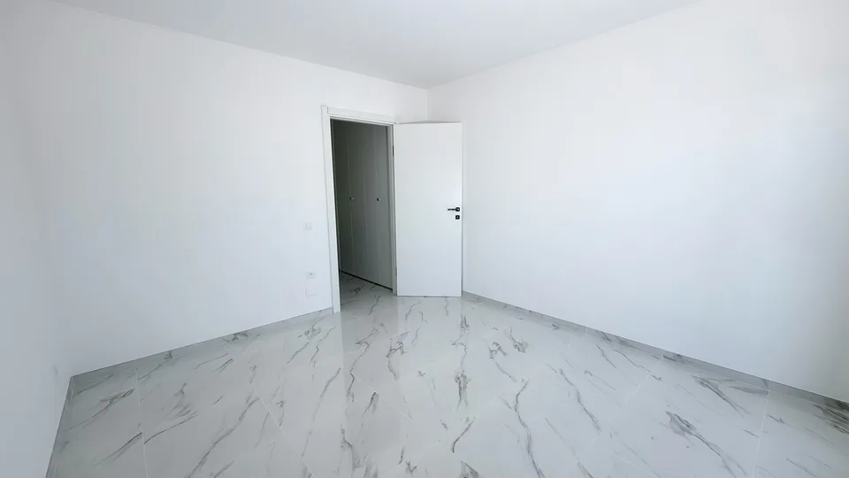 Lugano-Breganzona | Appartement de 3,5 pièces avec terrasse et parking – photo 12 sur 24