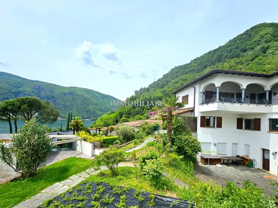 Wohnung in Villa: Erdgeschoss mit Garten, Terrasse und Seeblick