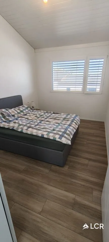 Magnifique appartement de 5.5P / 4 CHB / 2 SDB / 1 balcon / 1 Jardin /2 places de parc