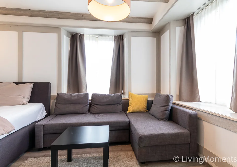 Furnished 1-room apartment with outdoor seating area