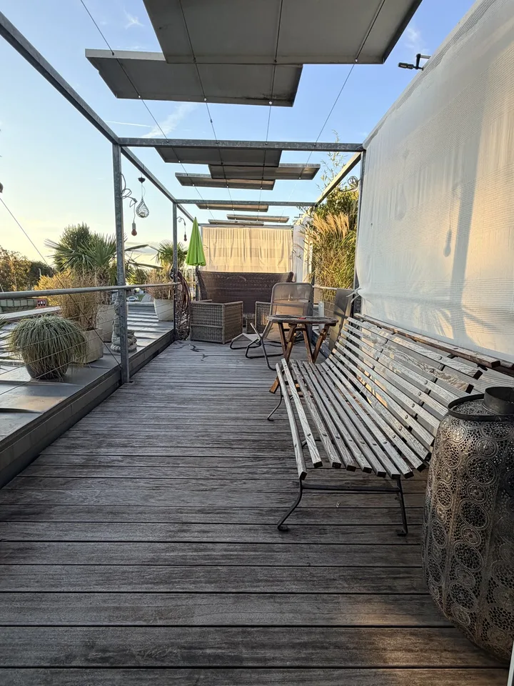 Appartamento di 3,5 locali in stile loft con vista lago e grande terrazza