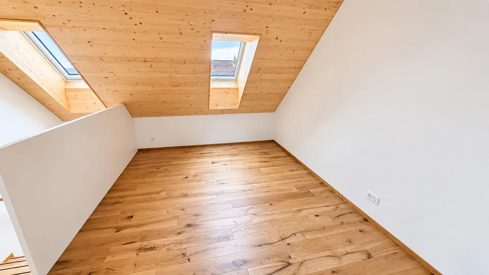 Bright attic apartment with modern renovation and charming wood details
