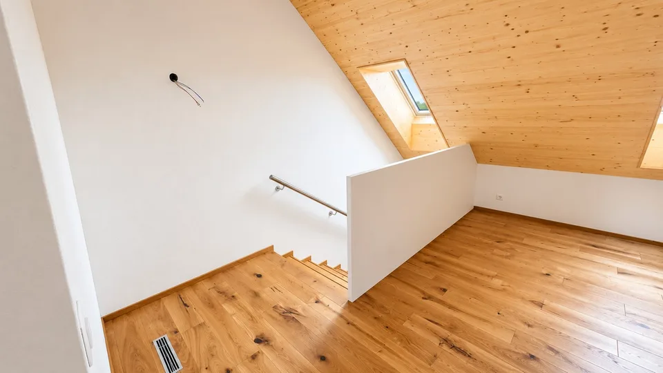 Bright attic apartment with modern renovation and charming wood details