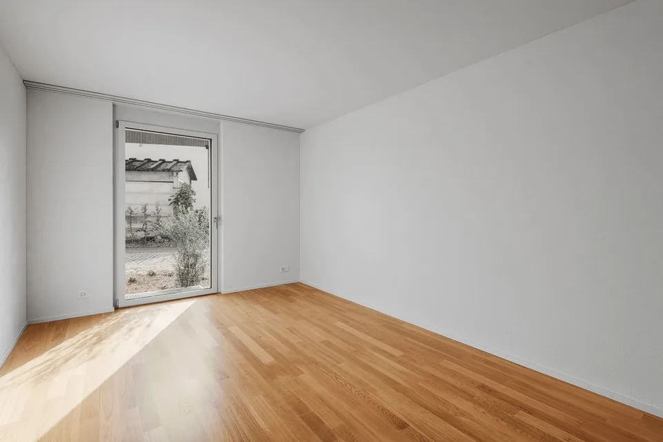 Appartamento moderno 2.5 locali con balcone & posto auto
