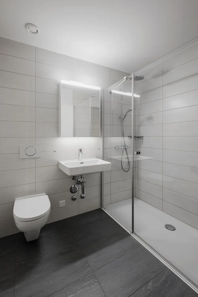Appartamento moderno 2.5 locali con balcone & posto auto