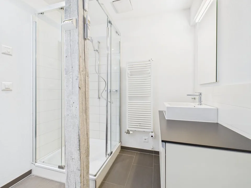 Moderne 3.5-Zimmer-Maisonettwohnung am Stampfenbachplatz – Foto 11 von 12