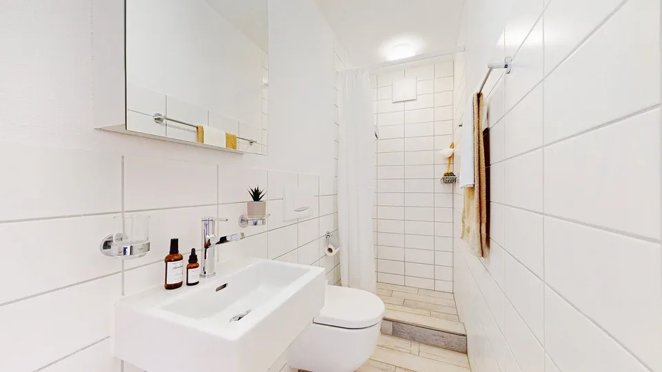 Appartement de jardin beau 4.5 pièces avec place de parking dans le garage souterrain