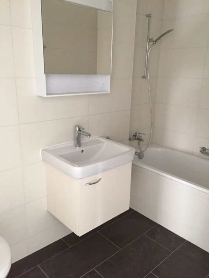 Courtaman, joli 2.5 pièces au 3ème étage d'un petit immeuble, coin verdoyant – photo 2 sur 2