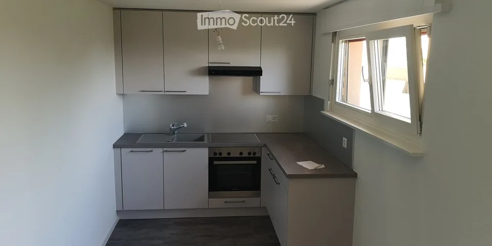 Charmantes 2.5-Zimmer-Wohnung, Zugang zum Garten, in NE – Foto 3 von 4