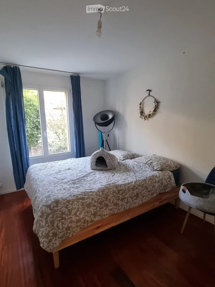 Schönes 4,5-Zimmer-Apartment mit Terrasse und Garten – Foto 8 von 11