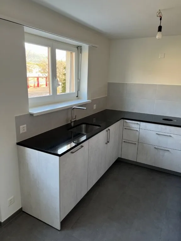4.5-room apartment with covered south balcony, garden seating area and lift – photo 17 of 24