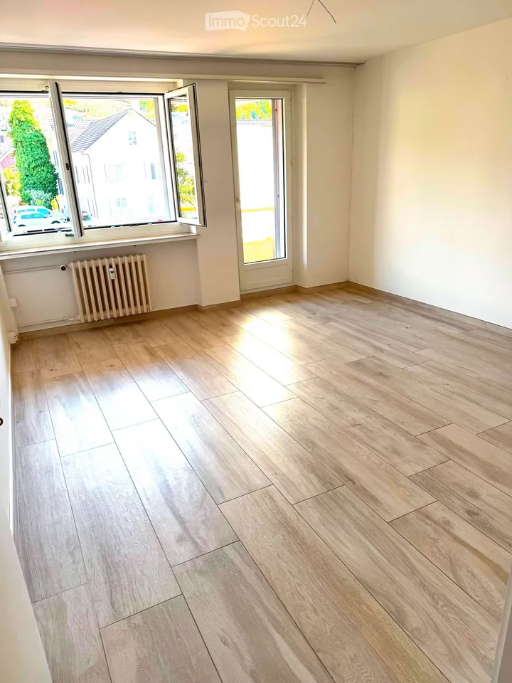 Charmante 3-Zimmer-Wohnung mit Südbalkon, Blick ins Grüne & Carport in Pratteln – Foto 4 von 11