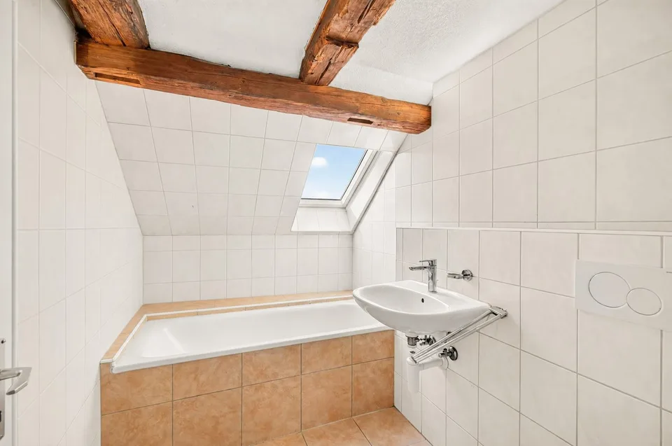 Maison familiale entièrement louée avec 5 appartements, 2 places de parking, 5,5% de rendement & potentiel de développement! – photo 12 sur 14