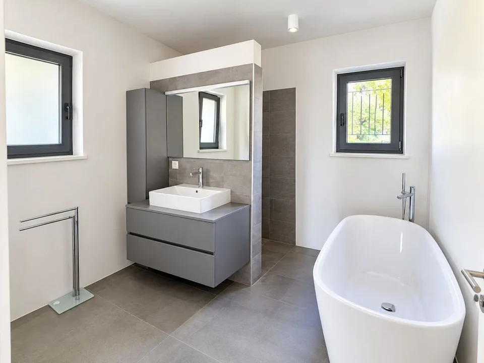 Porza - Elegantische 3.5-Zimmer-Wohnung mit Seeblick, Terrasse und privatem Garten – Foto 9 von 12