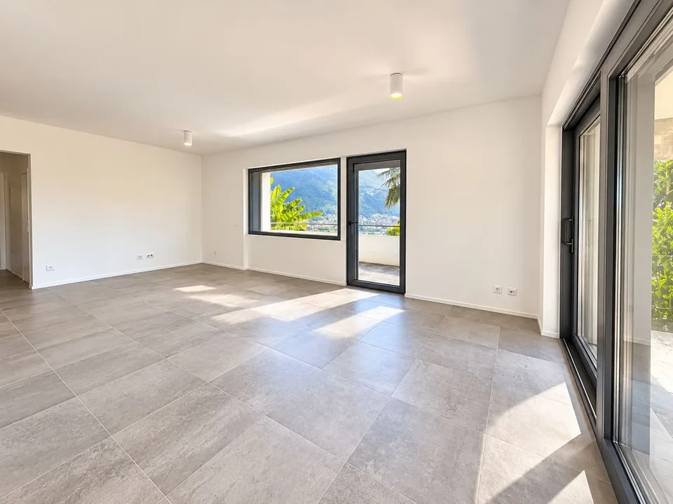 Porza - Elegantische 3.5-Zimmer-Wohnung mit Seeblick, Terrasse und privatem Garten – Foto 6 von 12