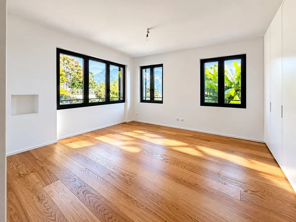Porza - Elegantische 3.5-Zimmer-Wohnung mit Seeblick, Terrasse und privatem Garten – Foto 7 von 12