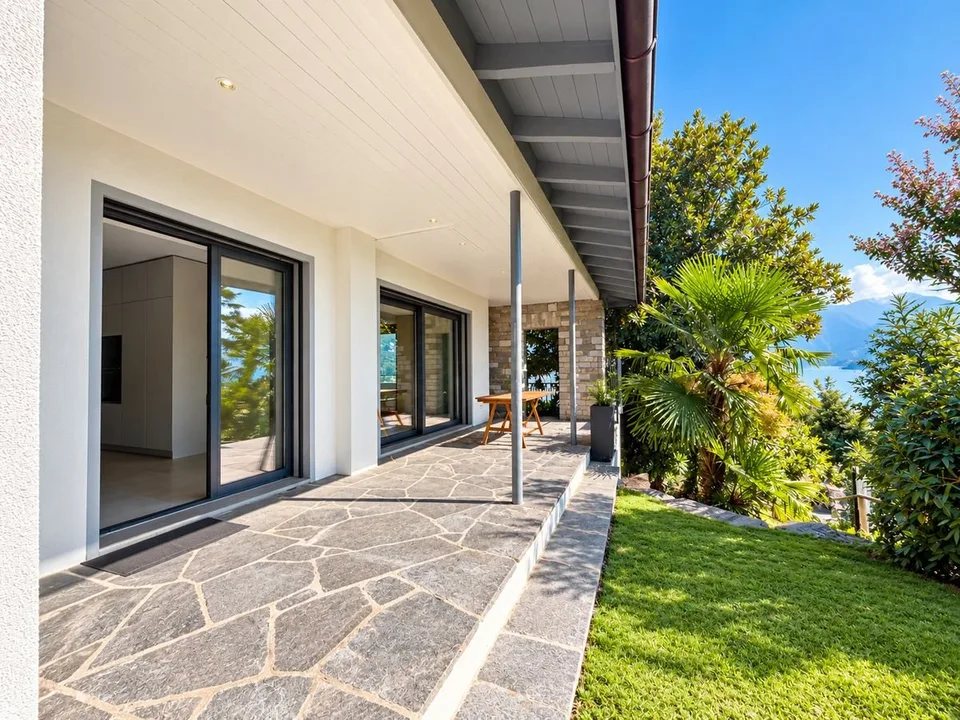Porza - Elegantische 3.5-Zimmer-Wohnung mit Seeblick, Terrasse und privatem Garten – Foto 11 von 12