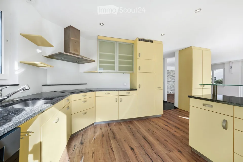 Modernes 6.5-Zimmer-Einfamilienhaus mit viel Wohnqualität, Garten und Whirlpool – Foto 5 von 22