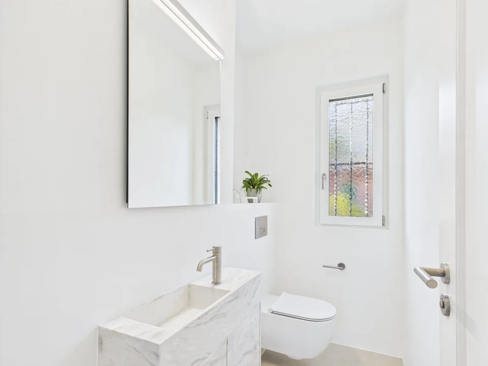 Casa a due famiglie ristrutturata ad Ascona – foto 11 di 13