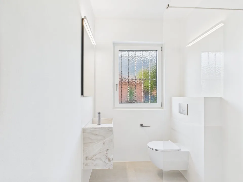 Casa a due famiglie ristrutturata ad Ascona – foto 10 di 13