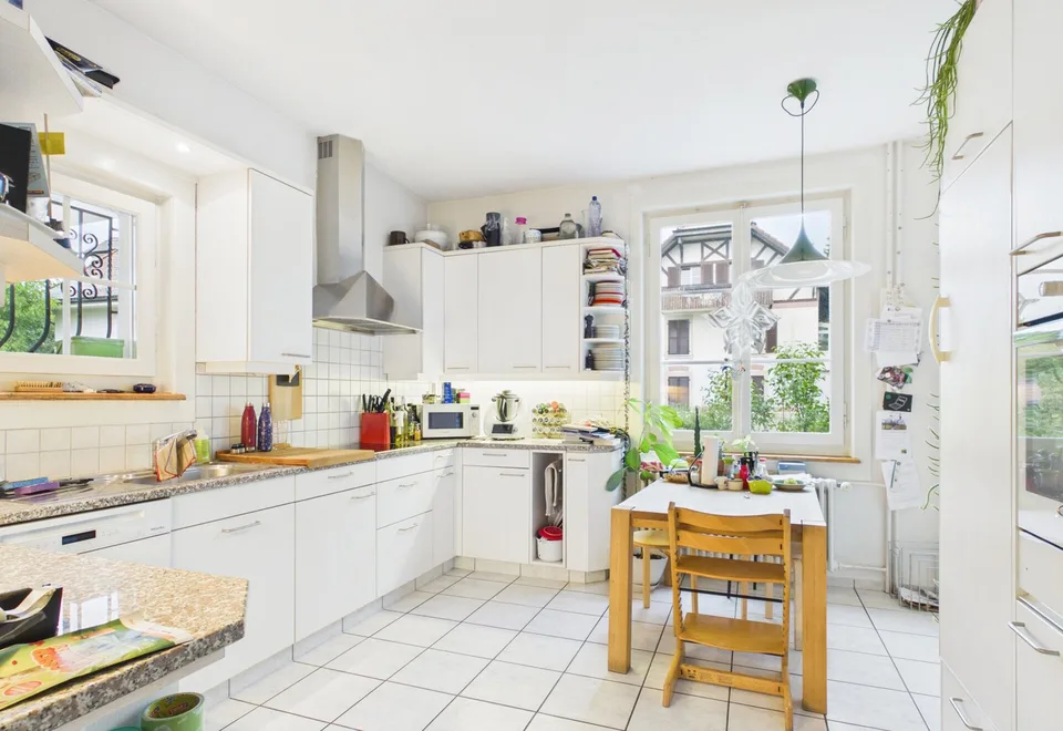 Una casa multifamiliare con carattere e un complesso di giardino idillico – foto 6 di 13