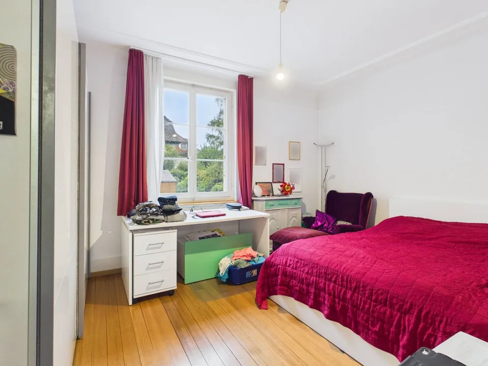 Una casa multifamiliare con carattere e un complesso di giardino idillico – foto 10 di 13