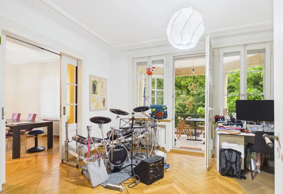 Una casa multifamiliare con carattere e un complesso di giardino idillico – foto 8 di 13