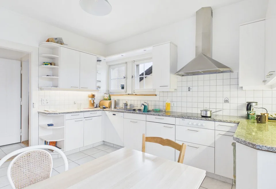 Una casa multifamiliare con carattere e un complesso di giardino idillico – foto 11 di 13
