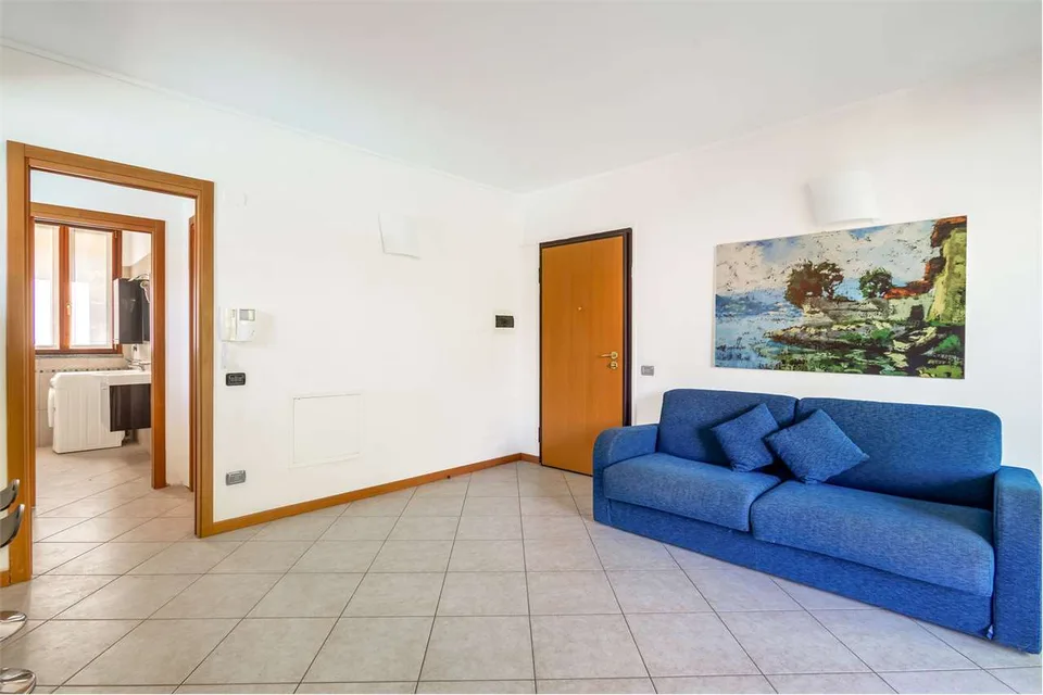 Immobilie mit überdachter Terrasse und Seeblick – Foto 5 von 13