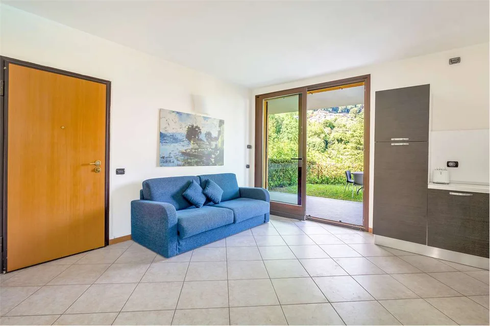 Immobilie mit überdachter Terrasse und Seeblick – Foto 4 von 13