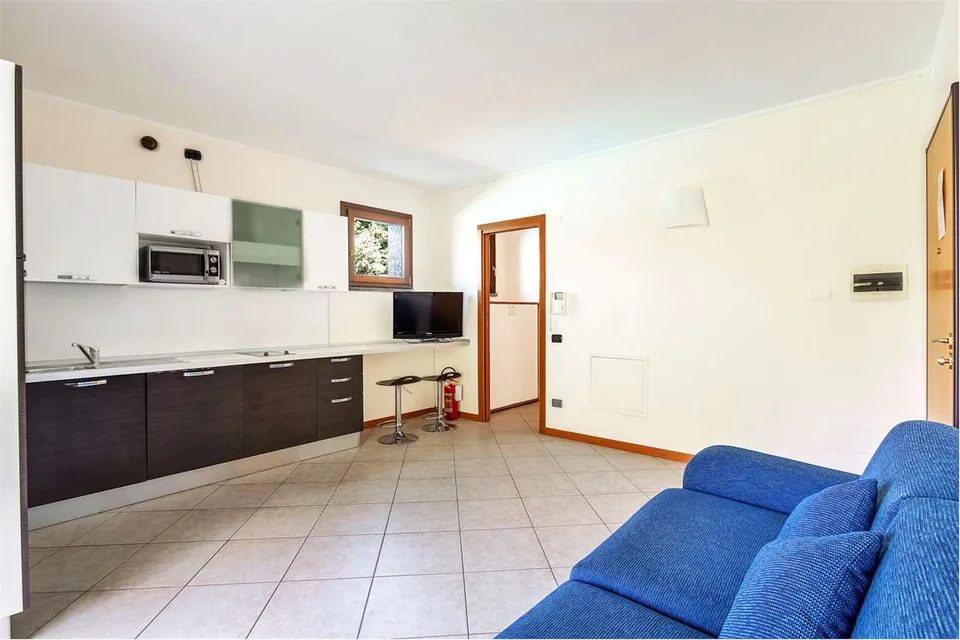 Immobilie mit überdachter Terrasse und Seeblick – Foto 6 von 13