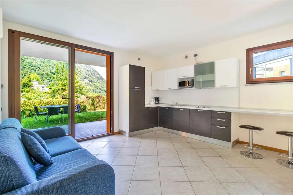 Immobilie mit überdachter Terrasse und Seeblick – Foto 7 von 13