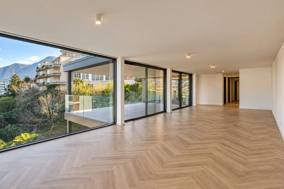 Esclusivo attico con splendida vista lago a Paradiso – foto 2 di 12