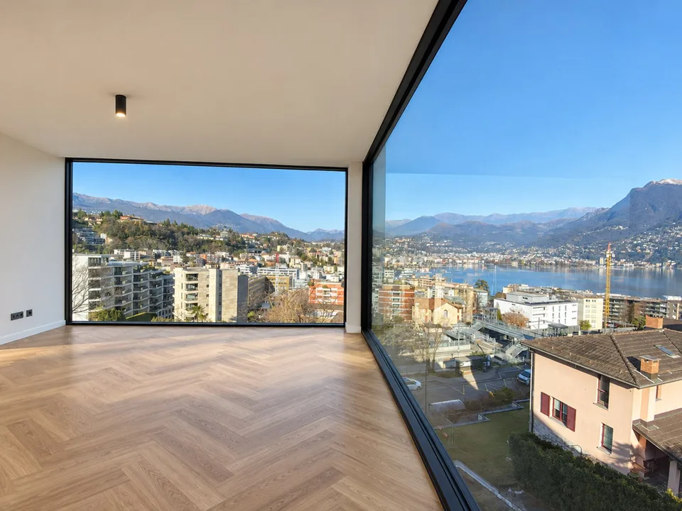Esclusivo attico con splendida vista lago a Paradiso – foto 3 di 12