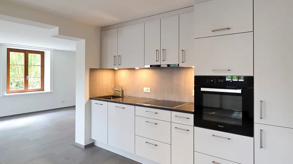 Charmante Wohnung mit Sitzplatz – Erstvermietung nach Totalsanierung – Foto 8 von 12
