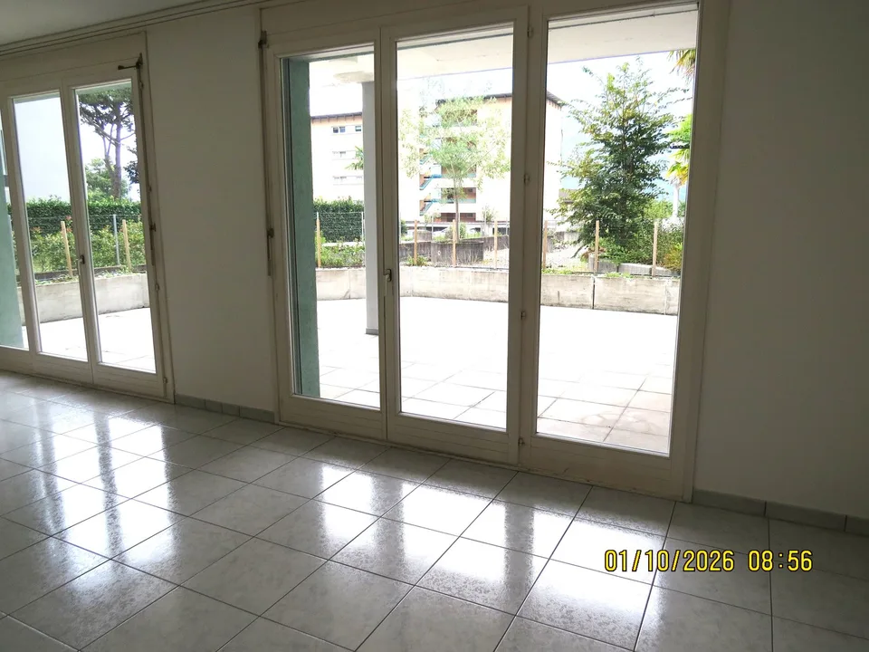 Apartment with terrace of 3.5 rooms in Melano – Available immediately – photo 2 of 7