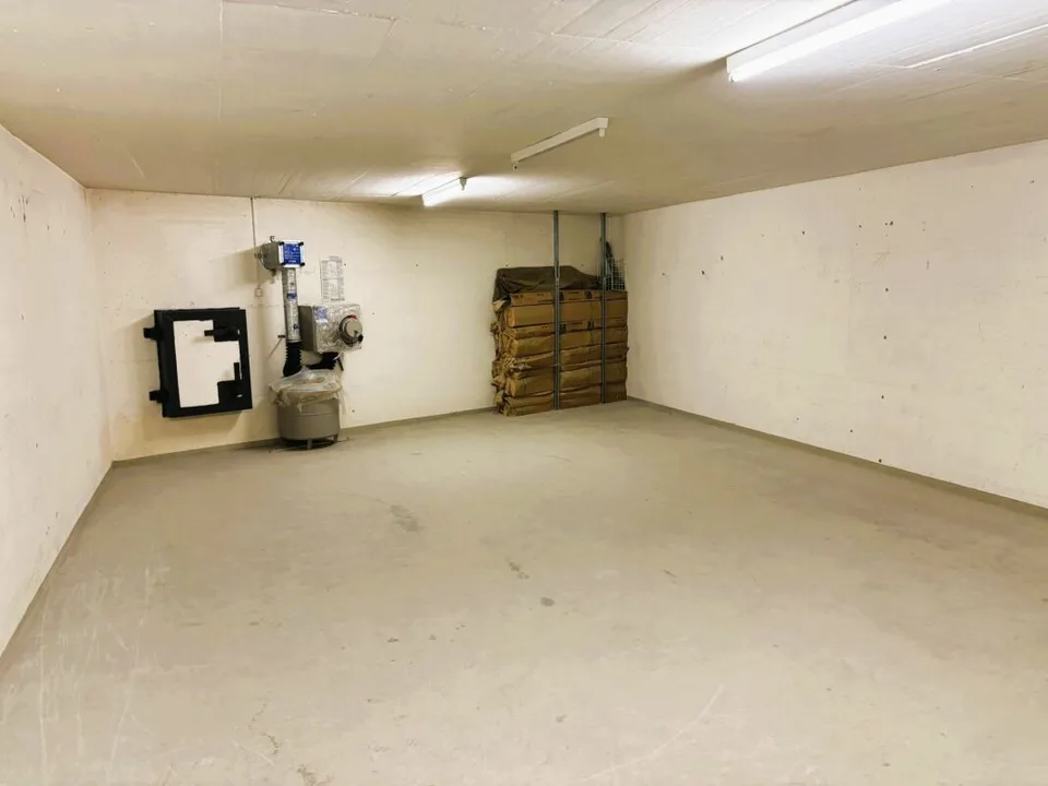 104 m² Lagerraum im 1. UG mit Anlieferungsrampe und Warenlift - Steinhausen – Foto 12 von 14