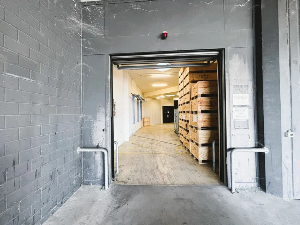 104 m² Lagerraum im 1. UG mit Anlieferungsrampe und Warenlift - Steinhausen – Foto 7 von 14