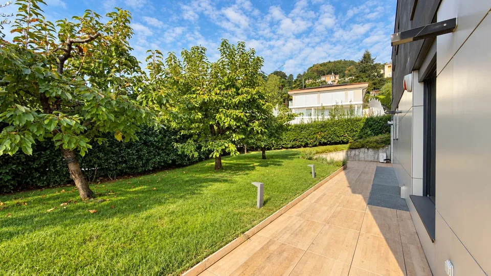 Appartement élégant et prestigieux avec jardin à Porza – photo 15 sur 26