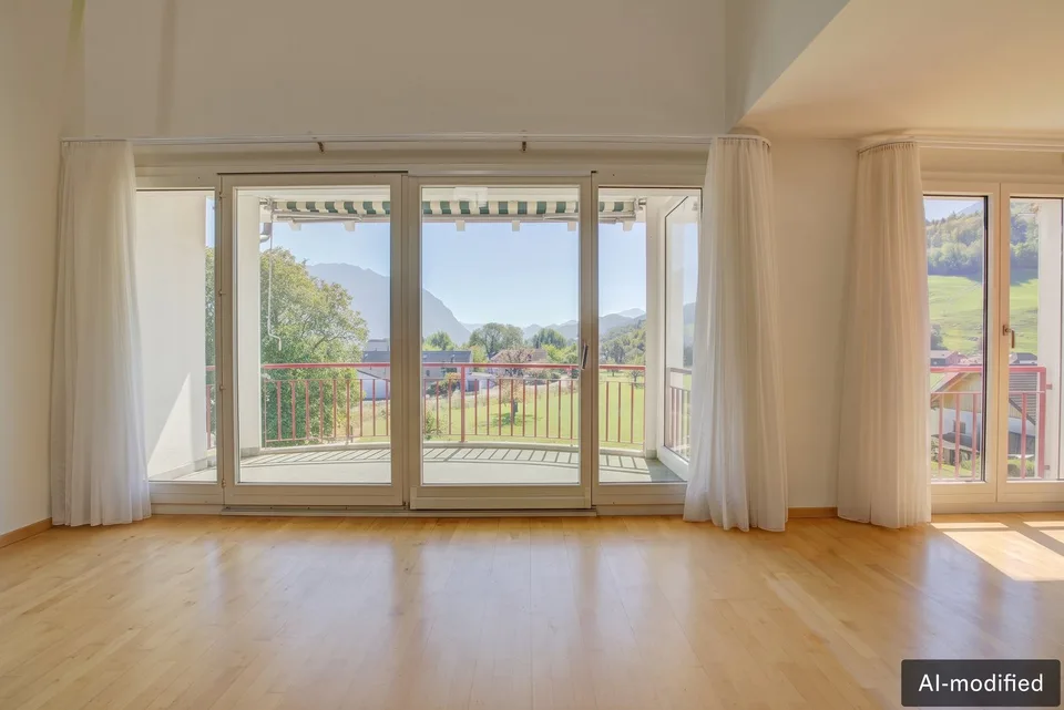 Appartamento mansardato di 5,5 locali con galleria, balcone sud e panorama montano – foto 4 di 13