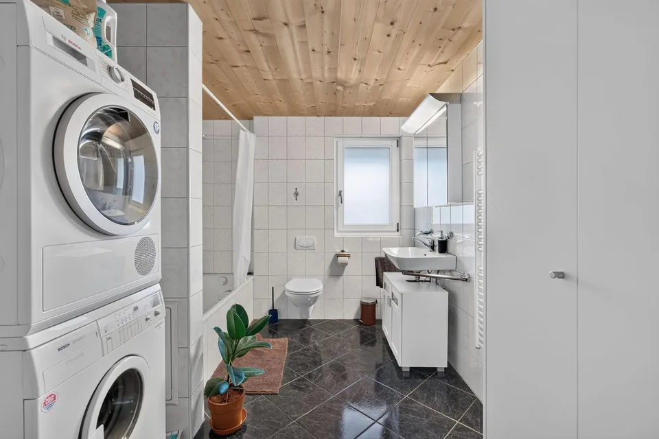 Maison bifamiliale avec deux appartements en duplex au centre du village de Balgach – photo 11 sur 15