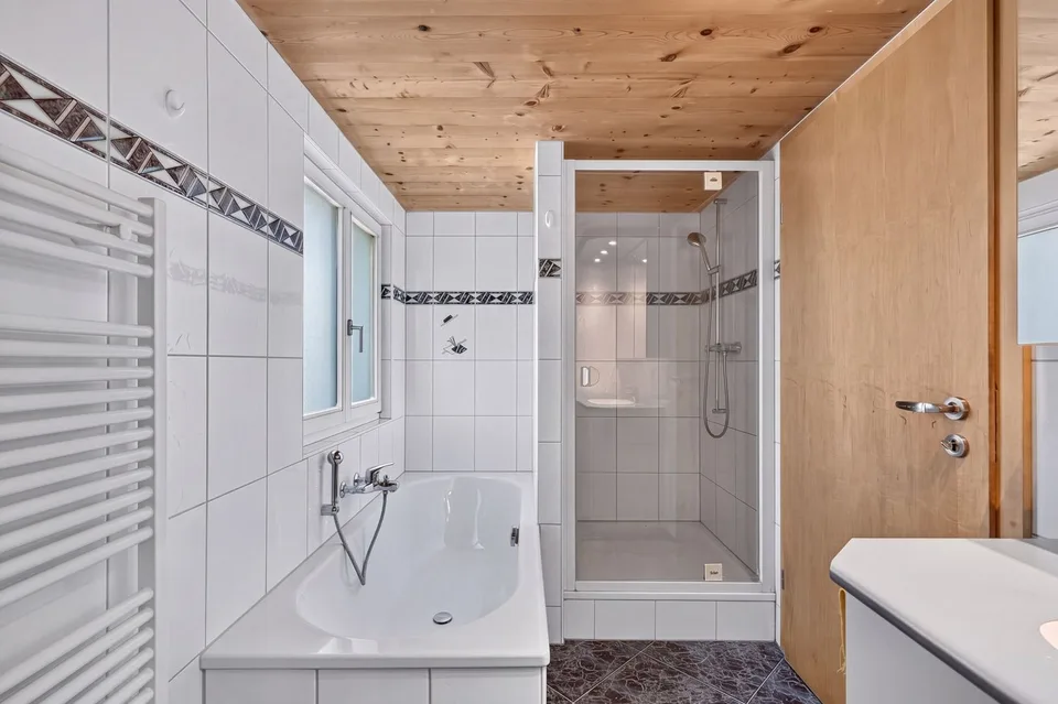 Maison bifamiliale avec deux appartements en duplex au centre du village de Balgach – photo 6 sur 15